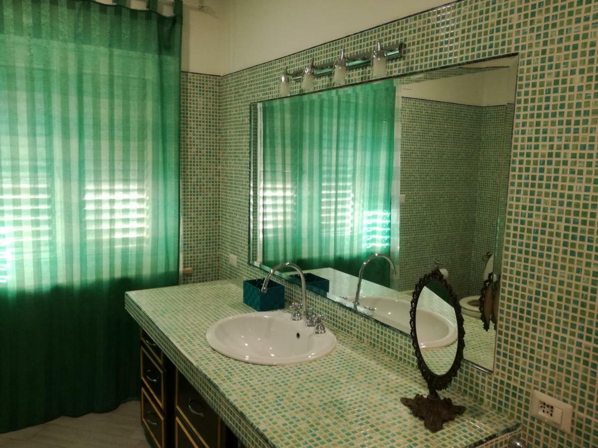 Casa Vacanze Villa Carmela Porto Torres Kamer foto